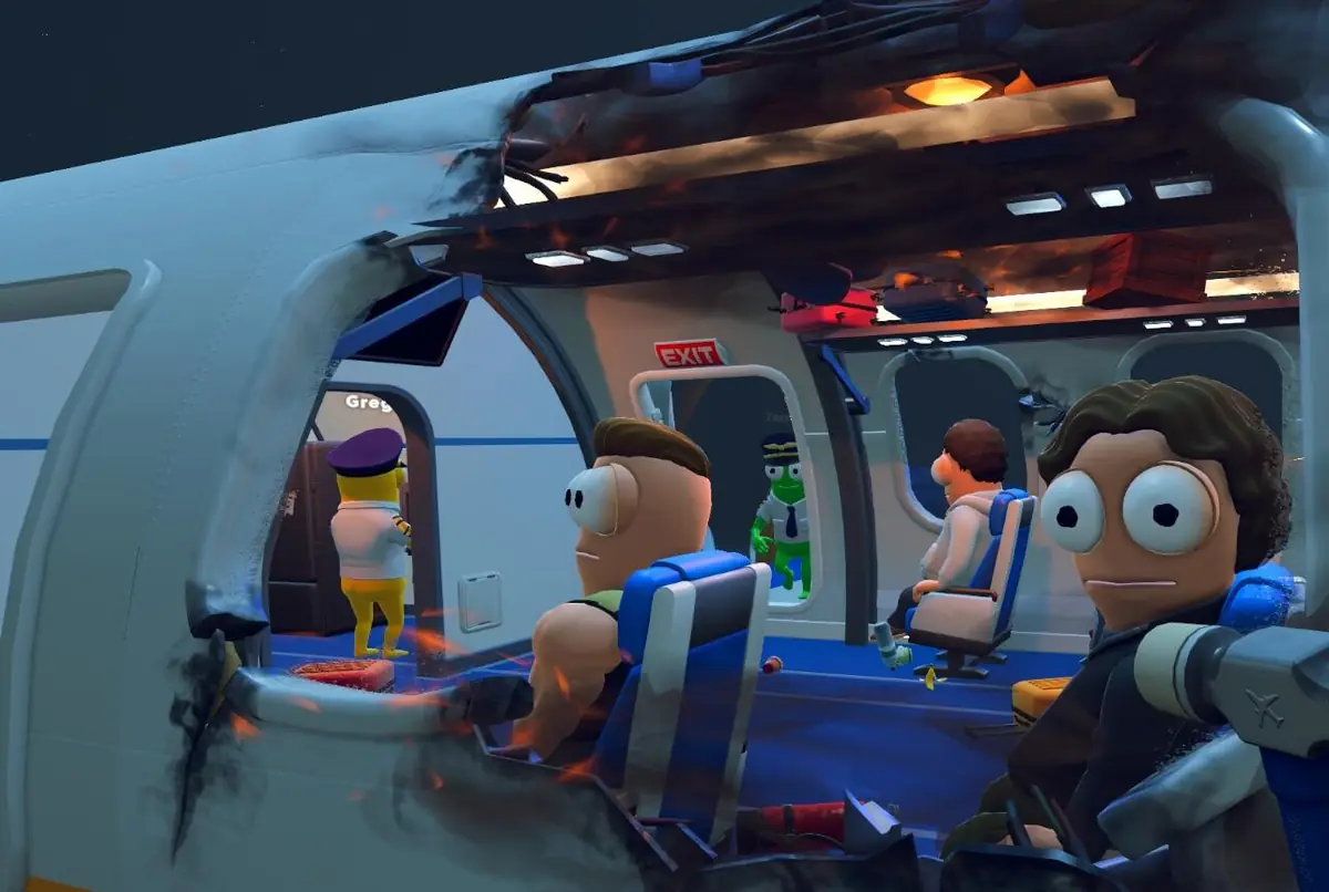 Smouldering hole burned through the fuselage above blue passenger seats